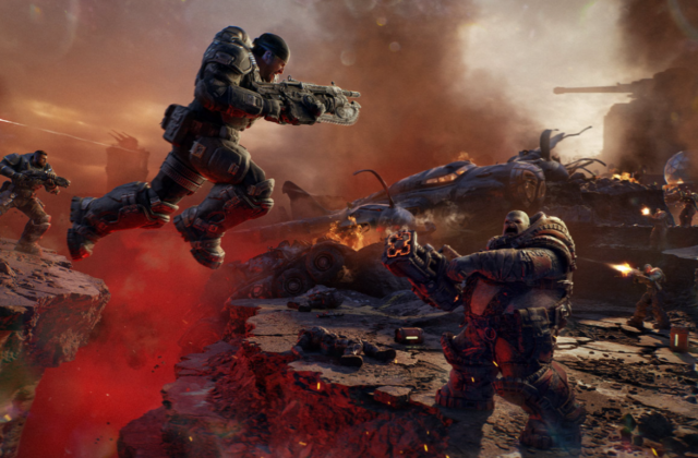 Kampfszene aus Gears of War: E-Day mit zwei schwer gepanzerten Figuren in einer zerstörten Umgebung.